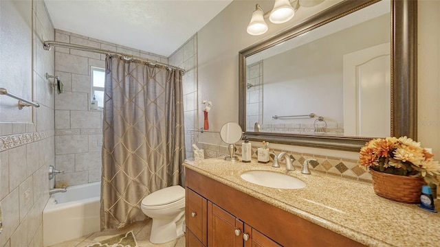 full bathroom with tile patterned flooring, vanity, shower / bath combo, and toilet