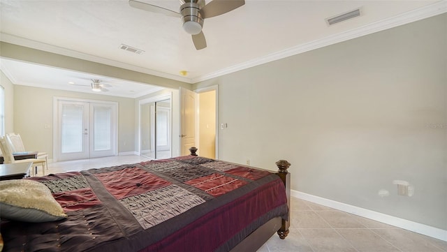 134 Da Vinci Dr, Nokomis, FL 34275 - bedroom with french doors, baseboards, light tile patterned floors, crown molding, and ceiling fan