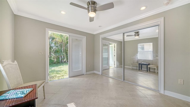 bedroom featuring ceiling fan, multiple windows, a closet, and crown molding