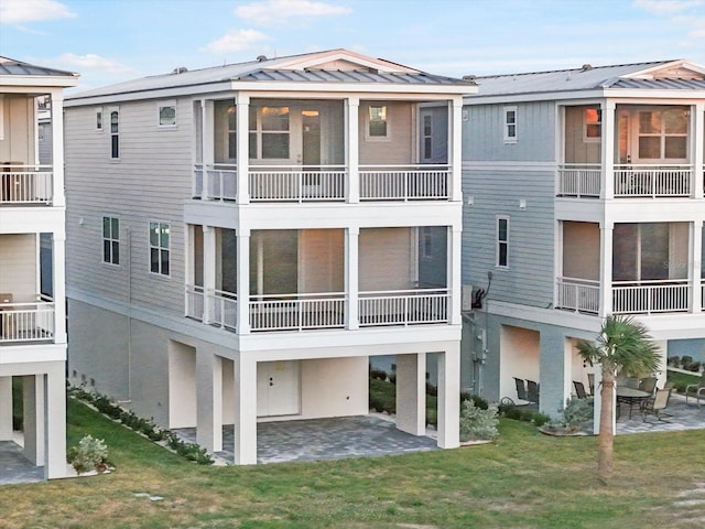 rear view of property with a patio