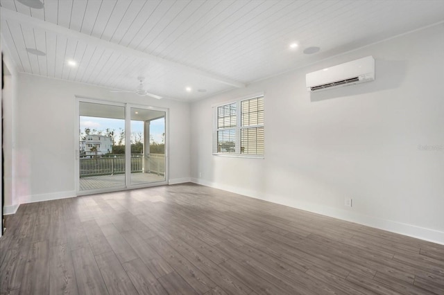 spare room featuring a wall unit AC, ceiling fan, wood ceiling, and hardwood / wood-style flooring