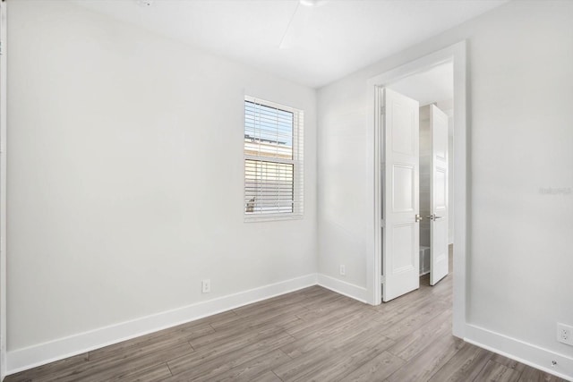 unfurnished room featuring light hardwood / wood-style flooring