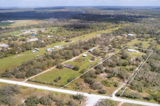 aerial view with a wooded view