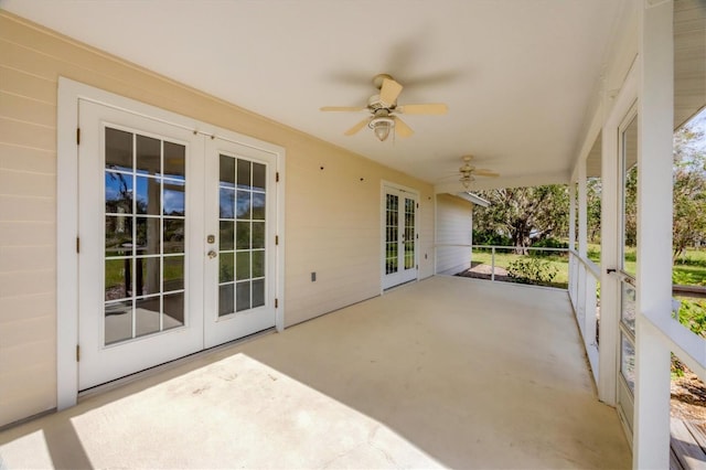 view of patio featuring french doors and ceiling fan