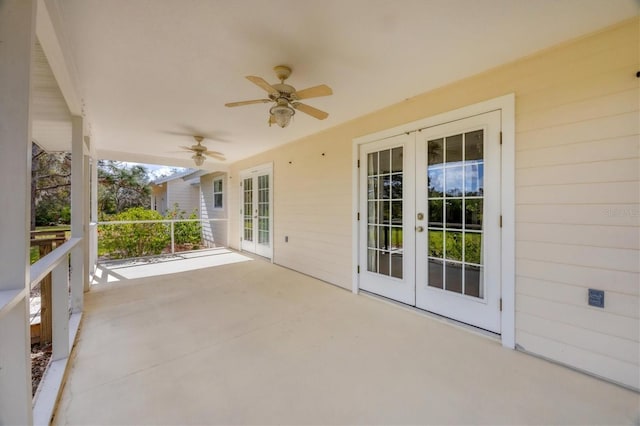 view of patio / terrace with french doors and a ceiling fan