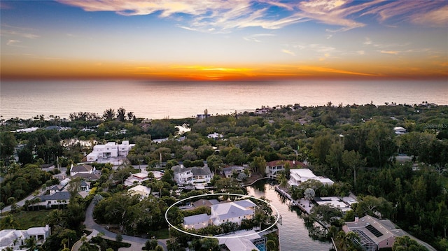 1243 Starboard Ln, Sarasota, FL 34242 - aerial view at dusk of a water view and a residential view