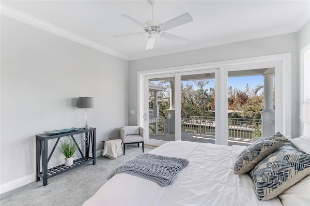 bedroom featuring ceiling fan, light colored carpet, access to exterior, and multiple windows