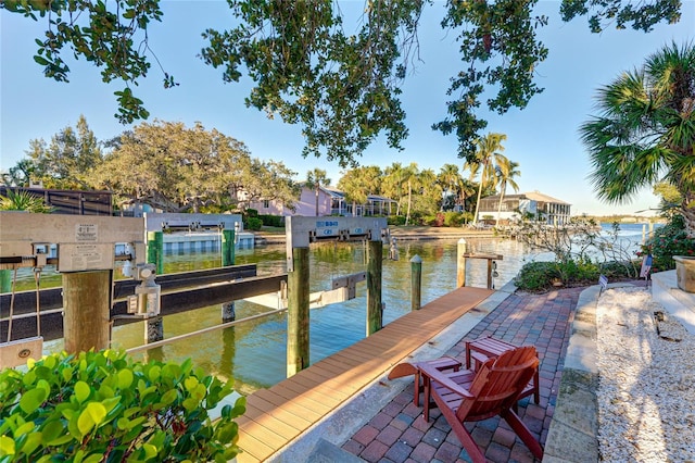 dock area featuring a water view