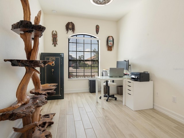 home office featuring light hardwood / wood-style flooring