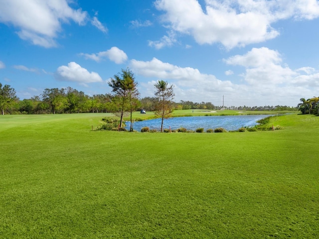 exterior space with a yard and a water view