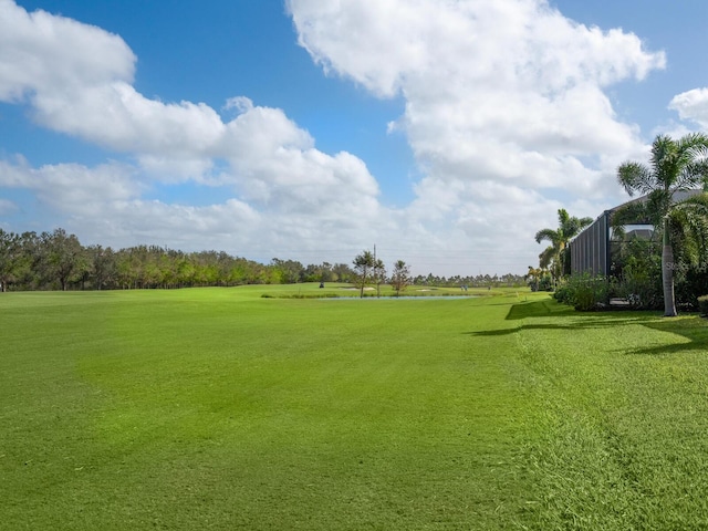 view of home's community featuring a lawn