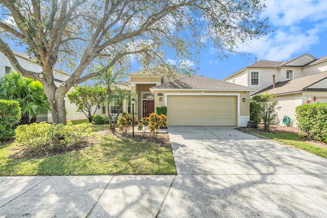 view of front of property with a garage