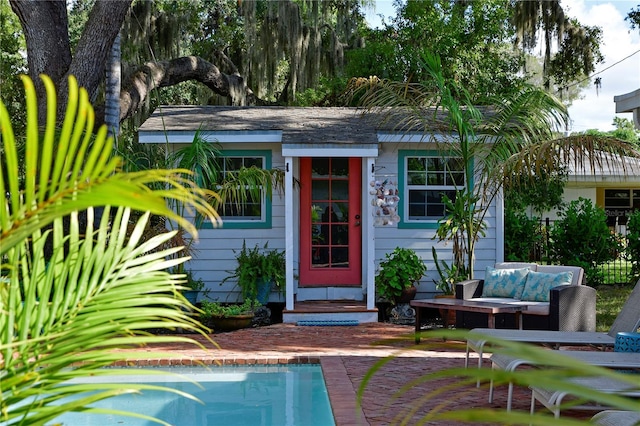 view of outbuilding with an outdoor living space