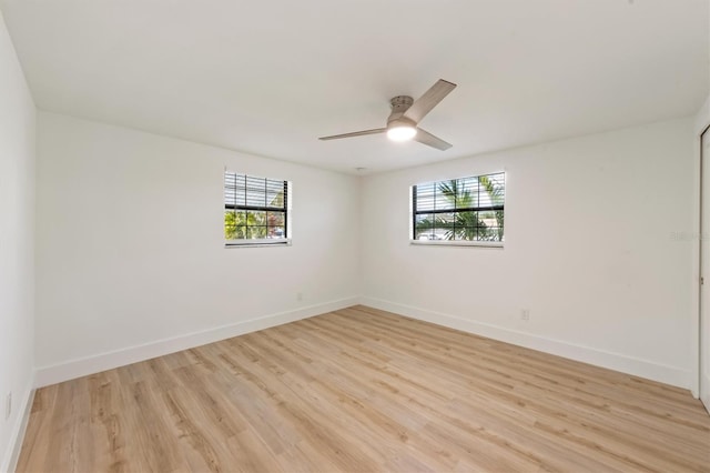 unfurnished room with ceiling fan and light hardwood / wood-style floors