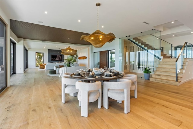 dining space featuring light hardwood / wood-style flooring