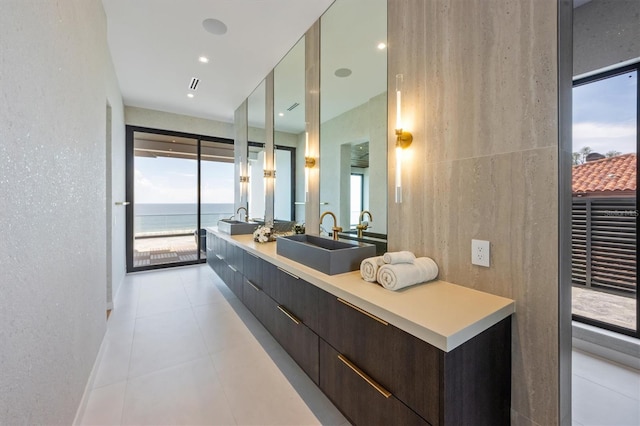 bathroom with vanity and a water view