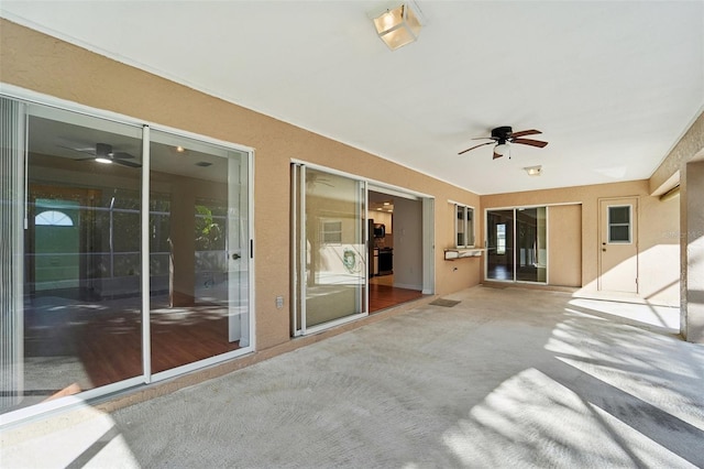 view of patio / terrace featuring ceiling fan