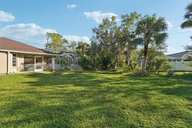 view of yard featuring a sunroom