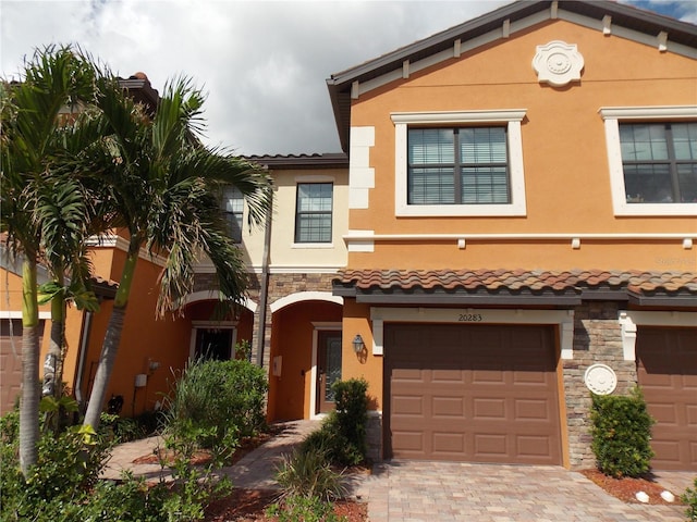 view of front of property with a garage