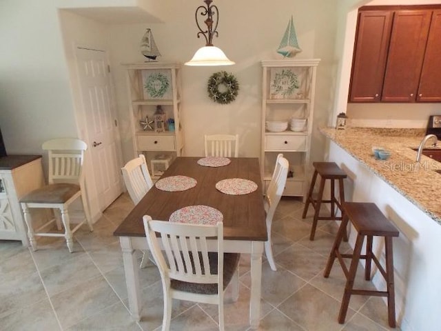 dining room with light tile patterned floors