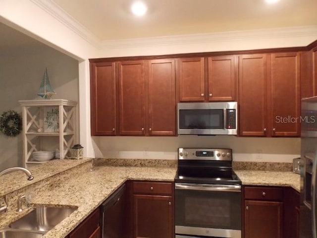 kitchen with light stone countertops, stainless steel appliances, ornamental molding, and sink