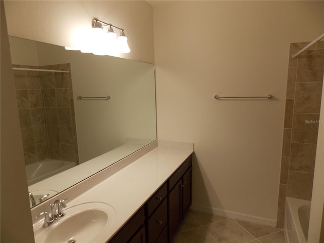 bathroom featuring tile patterned flooring and vanity