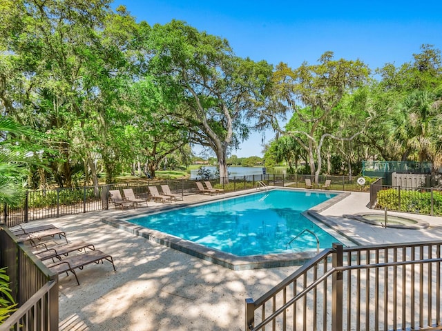 view of pool featuring a patio