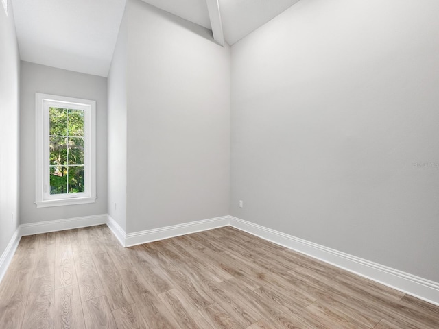 unfurnished room with light hardwood / wood-style flooring