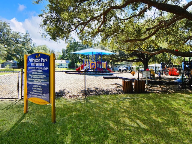 view of jungle gym featuring a yard