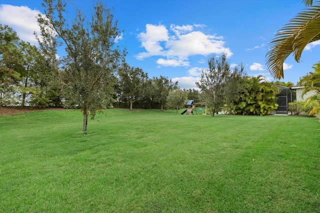 view of yard featuring a playground