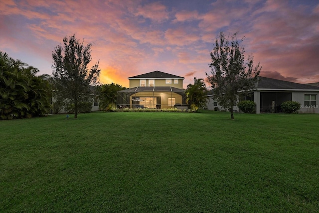 view of yard featuring a lanai