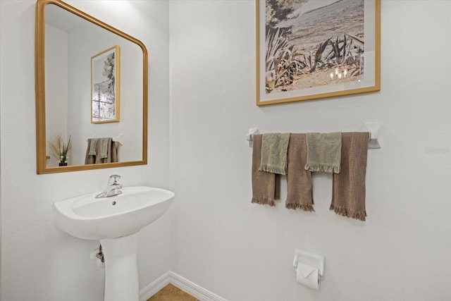 bathroom featuring baseboards