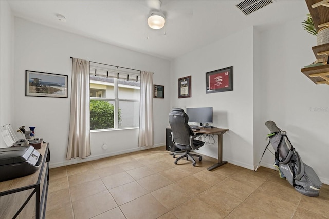 office space featuring visible vents, baseboards, and light tile patterned floors