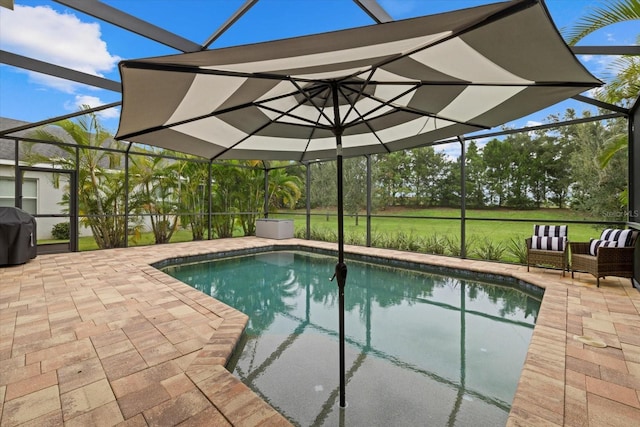 outdoor pool with a lanai, area for grilling, and a patio