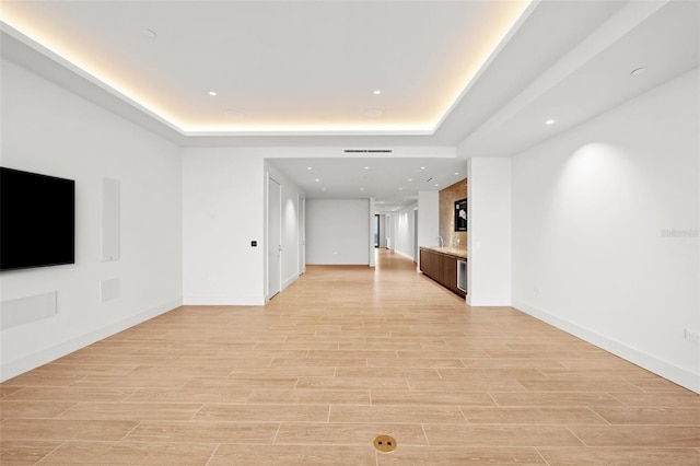 unfurnished living room featuring light wood-type flooring