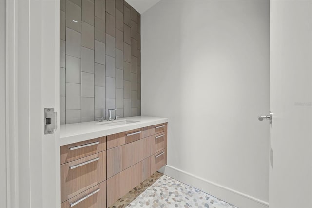 bathroom with vanity and tile patterned floors