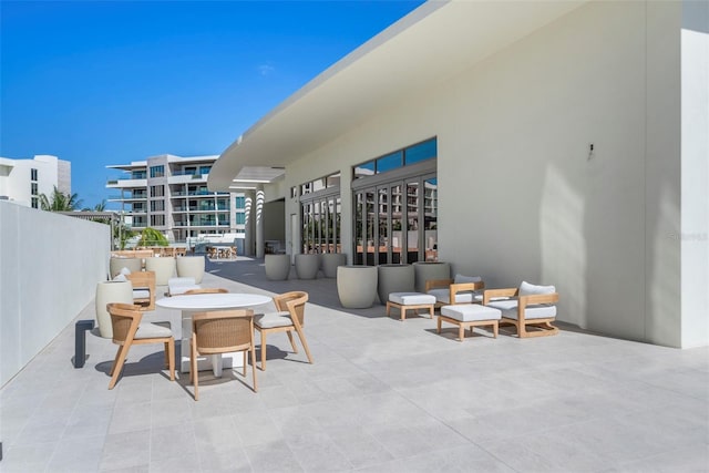 view of patio with a balcony