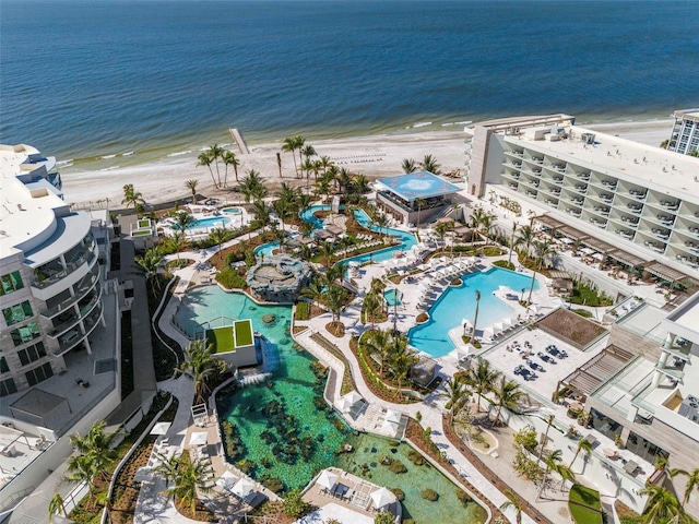 aerial view featuring a view of the beach and a water view