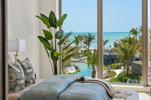 1591 Gulf Of Mexico Dr Unit 311, Longboat Key, FL 34228 - bedroom featuring a water view