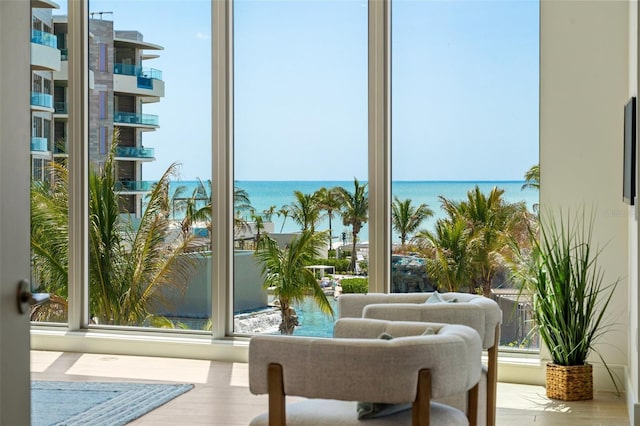 1591 Gulf Of Mexico Dr Unit 311, Longboat Key, FL 34228 - interior space featuring a water view and wood finished floors