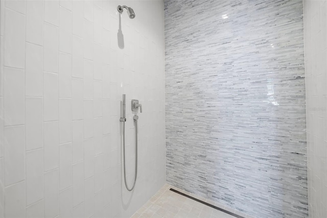 1591 Gulf Of Mexico Dr Unit 311, Longboat Key, FL 34228 - full bathroom with a tile shower