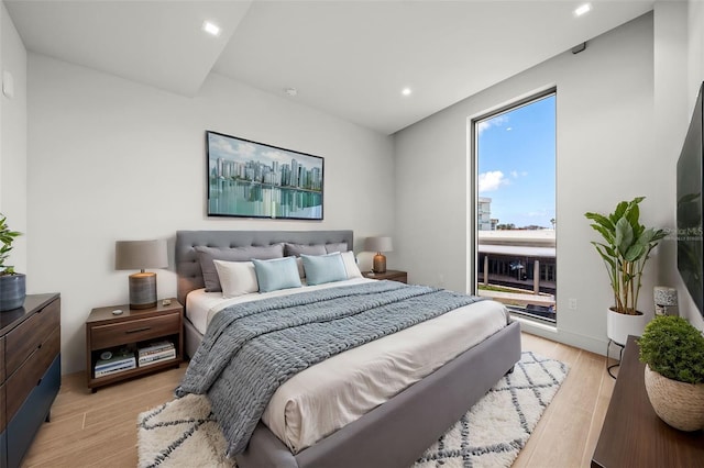 bedroom featuring light wood-type flooring