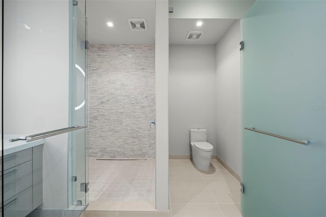 bathroom with tile patterned flooring, an enclosed shower, and toilet