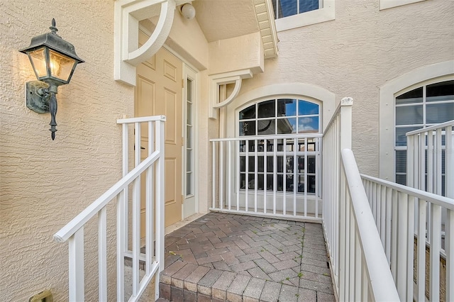 4517 Streamside Ct Unit 1905, Sarasota, FL 34238 - doorway to property featuring stucco siding