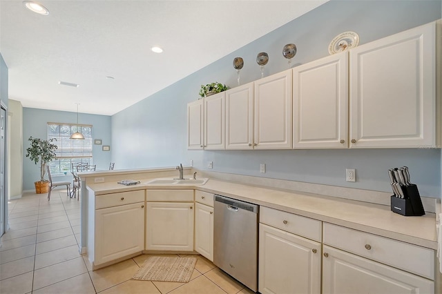 4517 Streamside Ct Unit 1905, Sarasota, FL 34238 - kitchen featuring dishwasher, a sink, light tile patterned floors, a peninsula, and recessed lighting