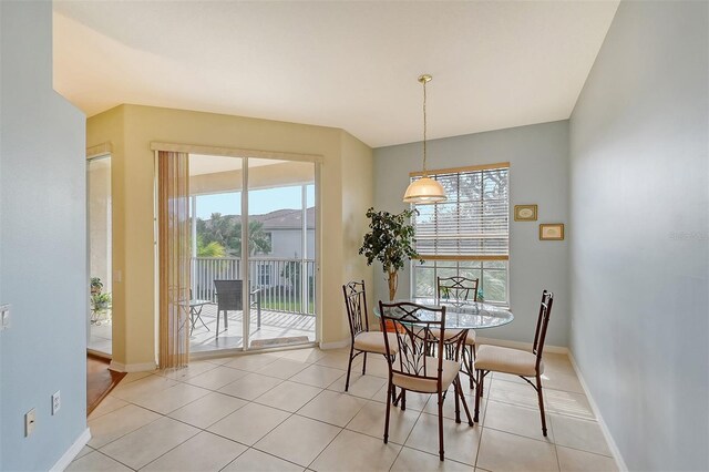 4517 Streamside Ct Unit 1905, Sarasota, FL 34238 - dining space featuring baseboards and light tile patterned floors