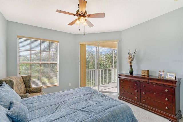 4517 Streamside Ct Unit 1905, Sarasota, FL 34238 - bedroom featuring access to outside, carpet flooring, and ceiling fan