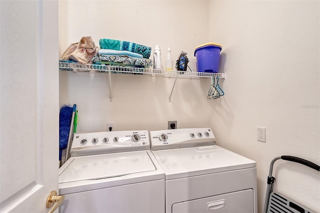 washroom featuring separate washer and dryer