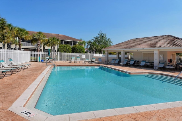 view of pool featuring a patio area