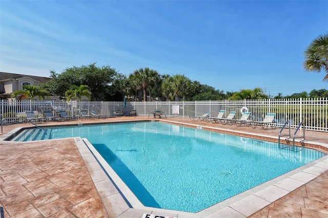 view of pool with a patio area